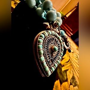 Intricate sterling silver and turquoise designed women’s necklace